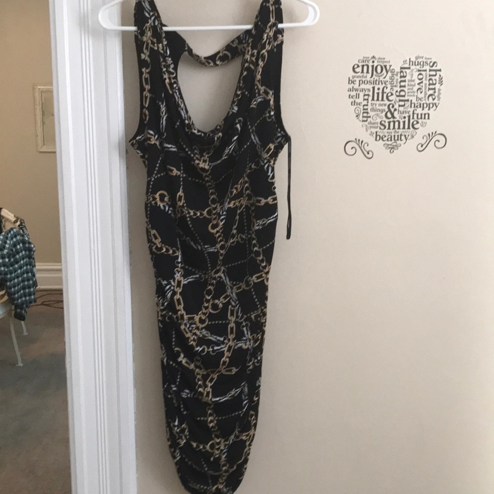 A 2x gold,black,&silver Forever 21 dress.
